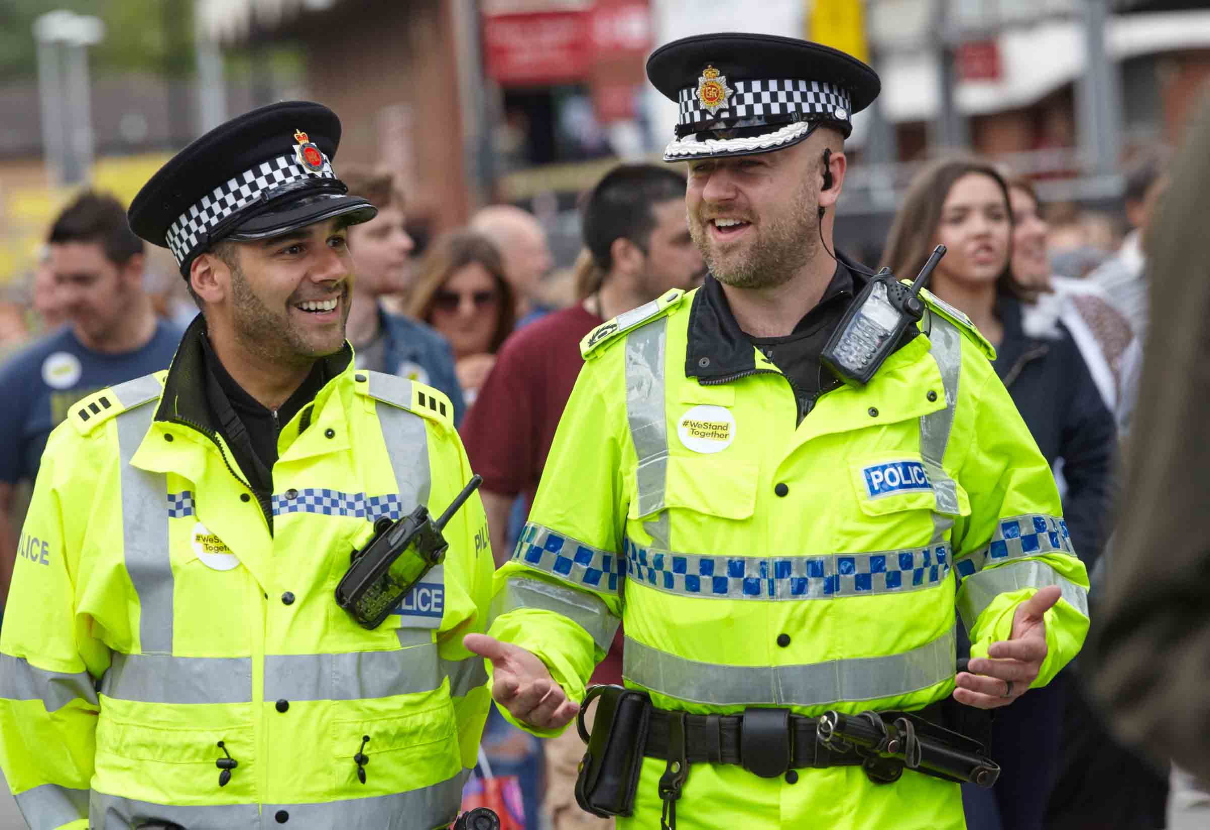 A photograph shows two police officers at the One Love concert in Manchester in 2017